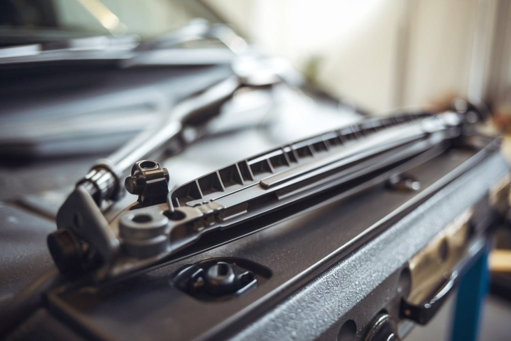 Wiper blades being fitted to a Volkswagen