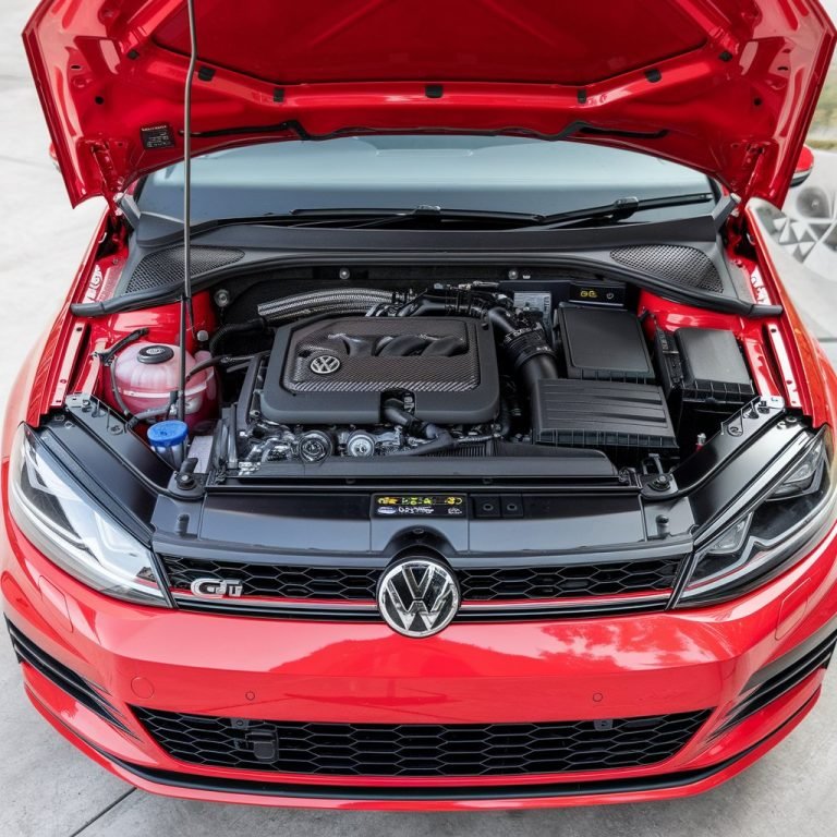 Red Volkswagen Golf GTI front view
