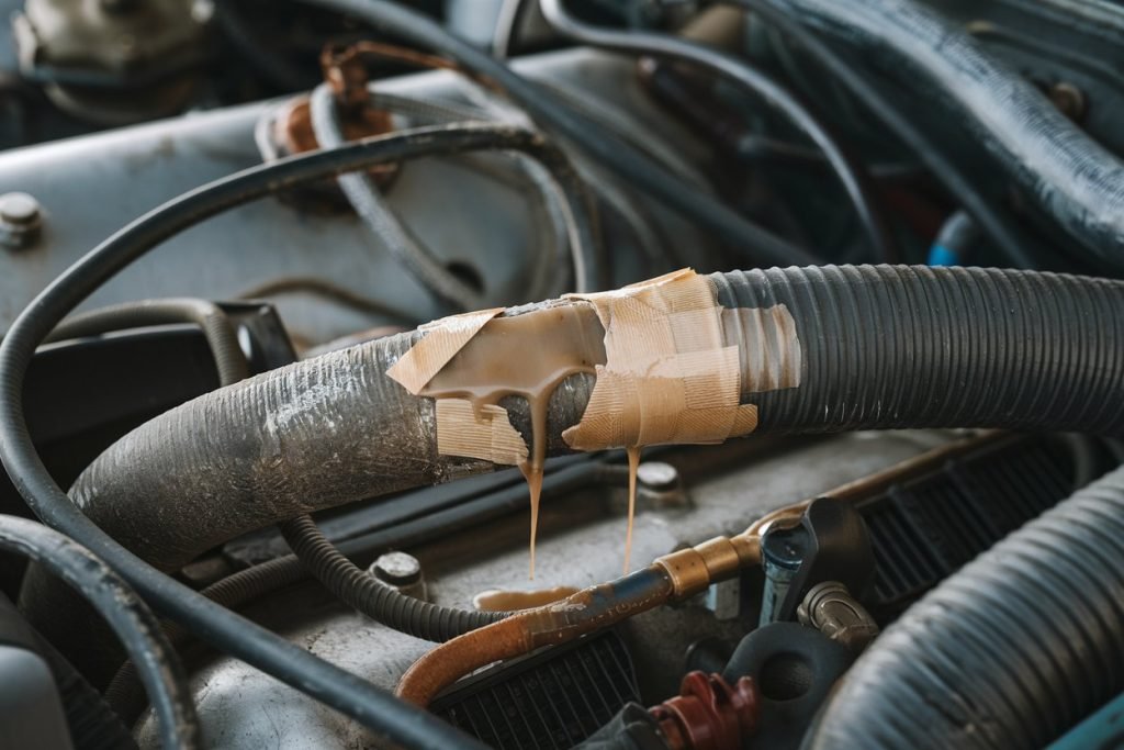 Damaged coolant hose on a Volkswagen engine