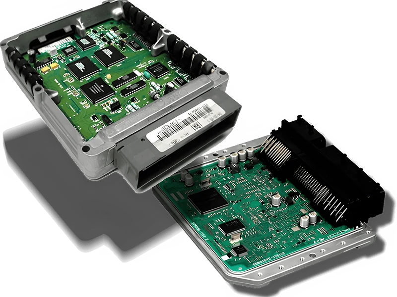 Open engine control unit housings showing electronic circuit boards